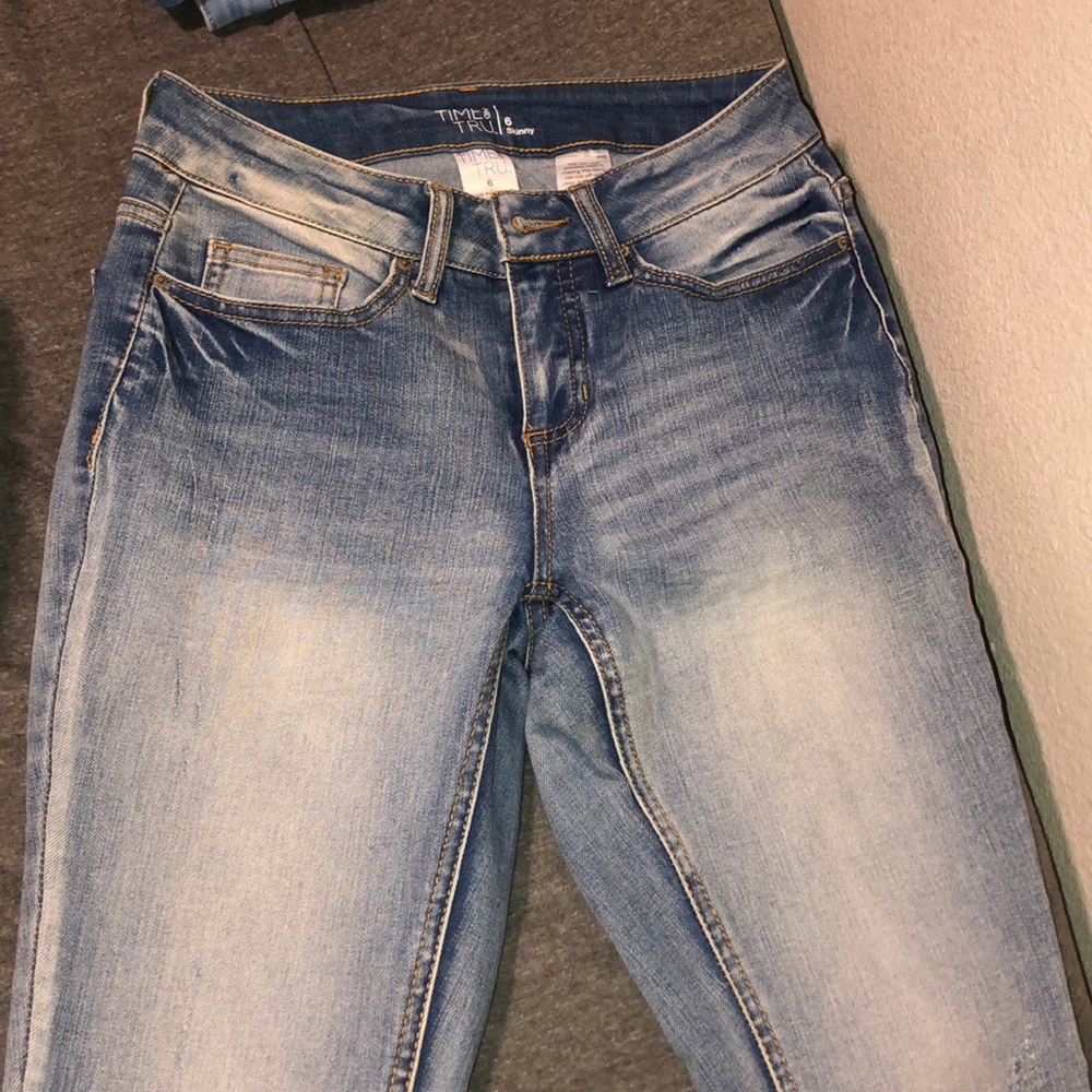 Never worn light wash jeans